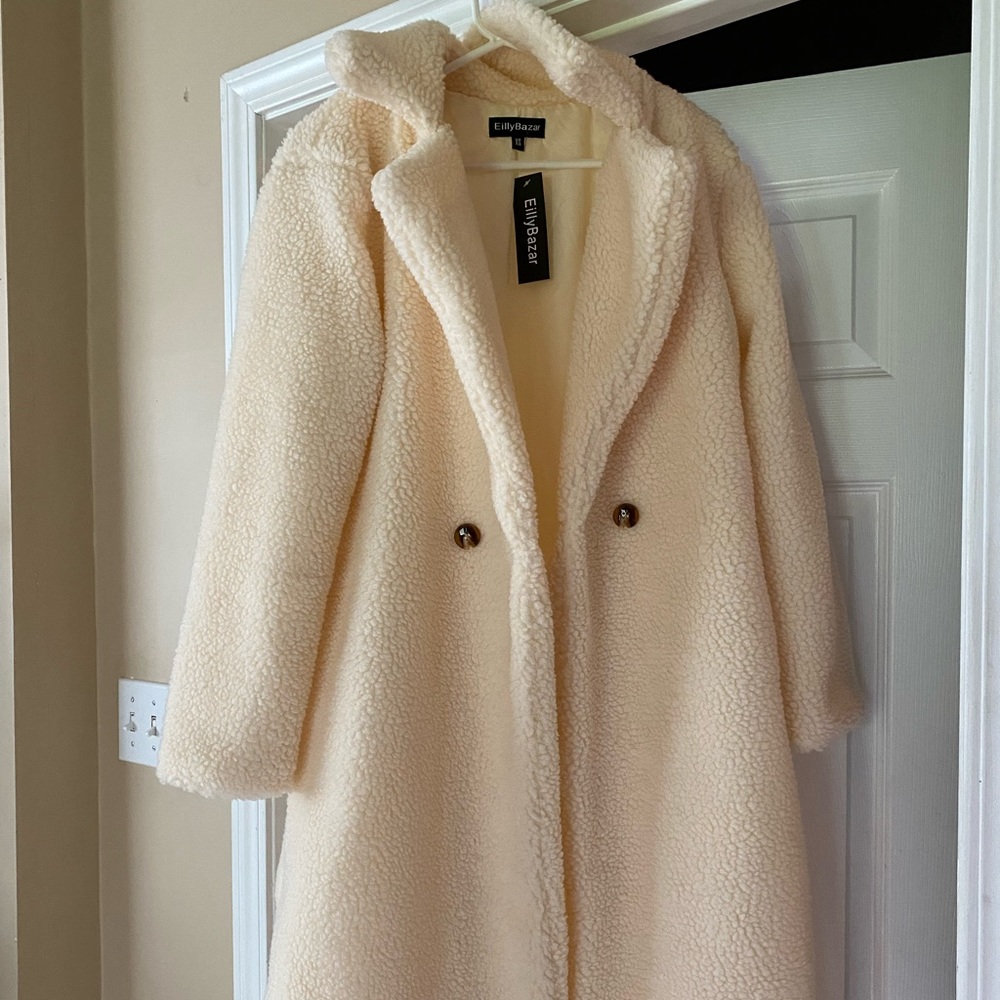 SHEIN white/cream teddy coat. Labeled as XS but has an oversized fit.